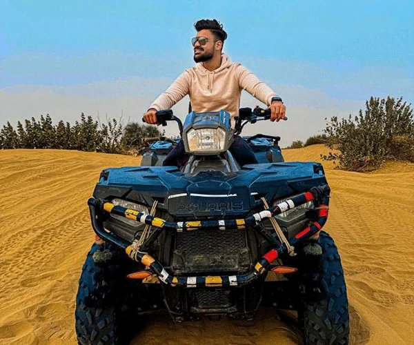 ATV quad biking across Sam Sand Dunes